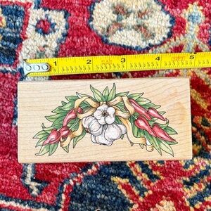 Floral Wooden Stamp with Red and Green Design